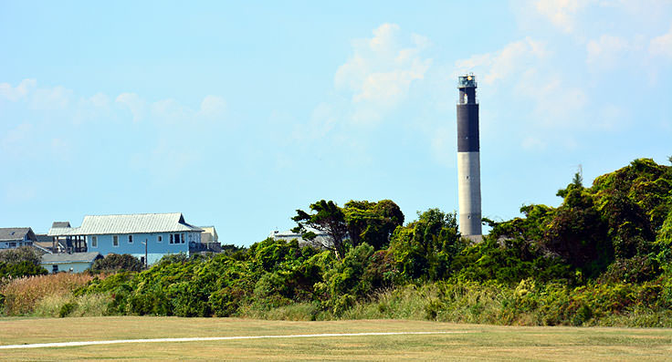 Oak Island Lighthouse is clearly visible from Fort Caswell